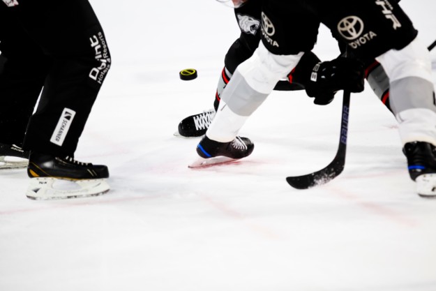 People playing ice hockey