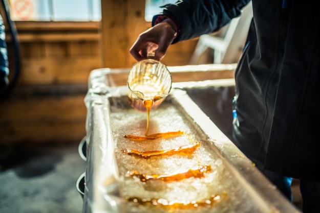 Maple sugar taffy being made at a sugar shack