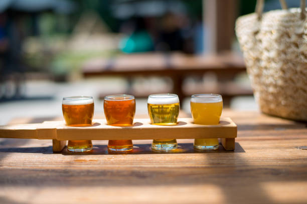 Small glasses of beer placed in a holder