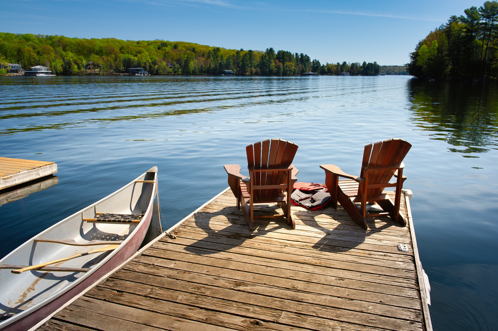 Chairs overlooking a lake in Muskoka