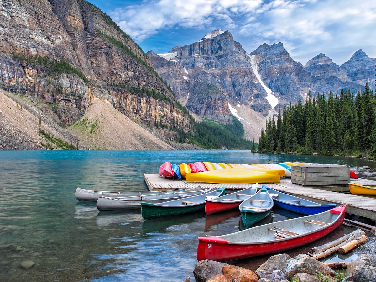 Canoes next to Moraine Lake
