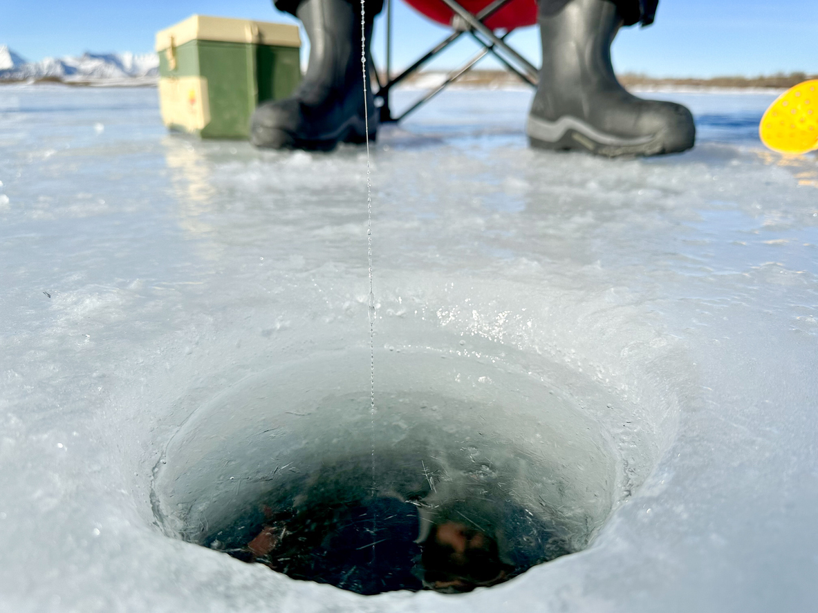 ice fishing in alberta, canada