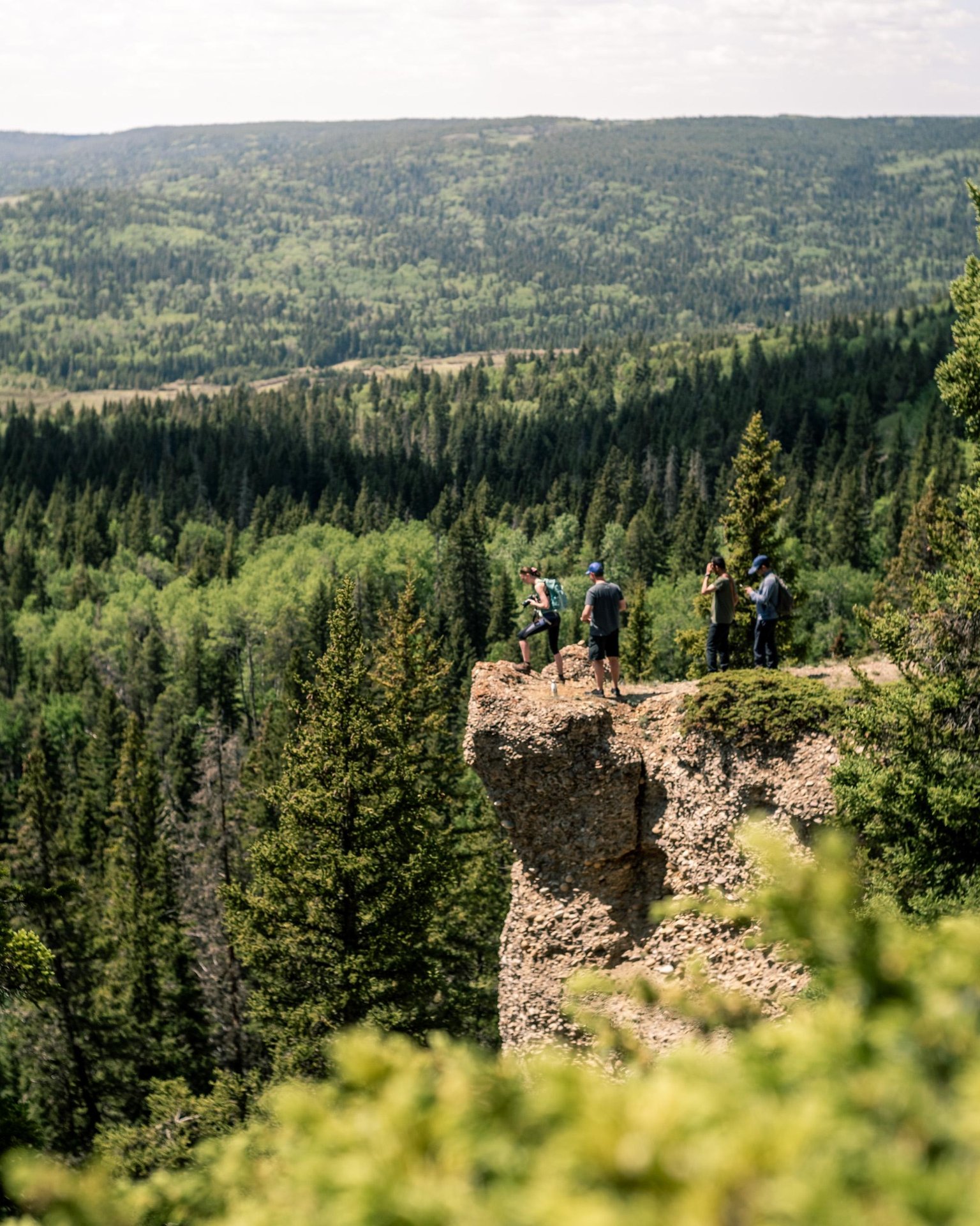 People enjoying the scenic views from the Conglomerate Cliffs in Cypress Hills Interprovincial Park, Saskatchewan 
